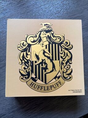 Warner Bros. Hufflepuff Crest in Yellow and Black